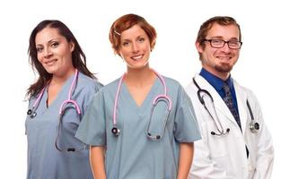 grupo de médicos ou enfermeiros sorridentes masculinos e femininos foto