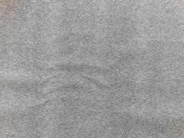 close-up perfeito de fundo de textura de tapete cinza monocromático de cima foto