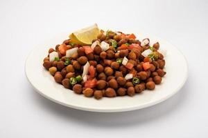 café da manhã na rua indiana chana chaat também conhecido como chana masala, chola chana chaat foto