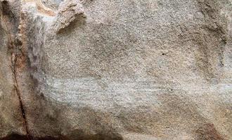 feche a vista em uma textura de granito e parede de pedra em alta resolução. foto