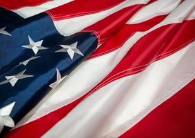 bandeira americana dos eua. dia da independência em 4 de julho, dia do memorial, dia dos veteranos, dia do trabalho. borrão foto