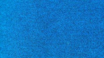 textura de pano azul como plano de fundo foto