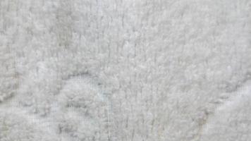textura de toalha branca como plano de fundo foto