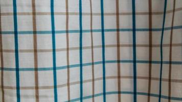 textura de pano branco com guingão como plano de fundo foto