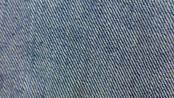 textura de jeans azul como pano de fundo foto