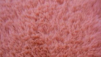 textura de lã rosa como pano de fundo foto