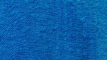 textura de toalha azul como pano de fundo foto
