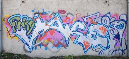 a textura da parede com graffiti, que é retratada nela. a imagem do grafite inteiro e completo do desenho como recurso para a concepção de projetos 3d foto