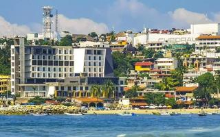 puerto escondido oaxaca méxico 2022 sol praia pessoas ondas e barcos em puerto escondido méxico. foto