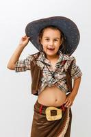 linda garotinha com chapéu de cowboy foto