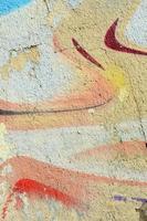 pinturas abstratas de grafite na parede de concreto. textura de fundo foto