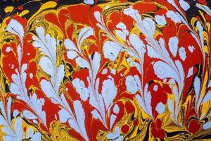 textura abstrata do fundo com pintura marmorizada ebru com padrões florais foto
