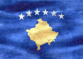 ilustração 3D de uma bandeira do Kosovo - bandeira de tecido acenando realista foto