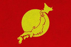 bandeira do japão e mapa de contorno do país na textura. colagem. foto