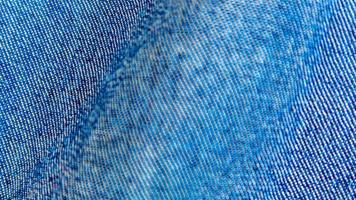 textura de jeans azul como plano de fundo foto