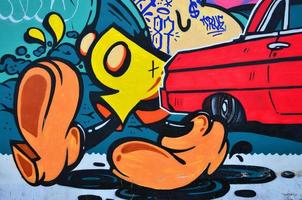 uma imagem detalhada do desenho do graffiti. um fundo conceitual de arte de rua com personagens de desenhos animados foto