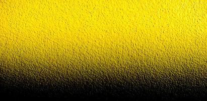 as paredes são amarelo áspero, gradiente preto. modelo de design de fundo de pano de fundo foto