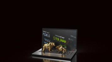 o touro de ouro e o urso no notebook para renderização em 3d do conceito de negócios foto
