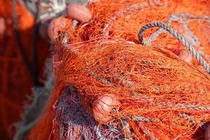 detalhe da rede de pesca dos pescadores foto