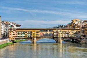 florença ponte vecchio vista do pôr do sol foto