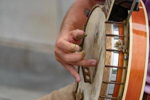 tocador de banjo artista de rua em nyc foto