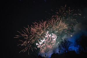 castelo de liubliana feliz ano novo fogos de artifício foto