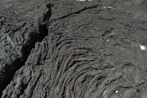 campo de lava pico açores pelo detalhe do mar foto