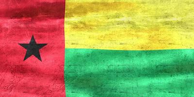 bandeira da guiné-bissau - bandeira de tecido acenando realista foto