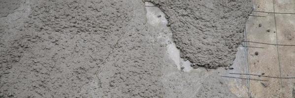 mistura de concreto de textura é a introdução de cimento, pedra, areia e água foto