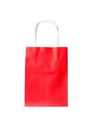 sacola de compras vermelha de reciclagem ecológica isolada no fundo branco foto