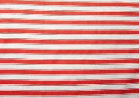 textura de toalha de mesa vermelha, close-up. tecido padrão xadrez. foto