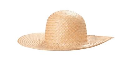 lindo chapéu de palha com fita e laço em fundo branco. vista superior do chapéu de praia isolada foto
