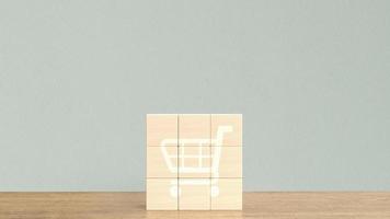 o ícone do carrinho de compras no cubo de madeira para renderização 3d do conceito de negócio foto