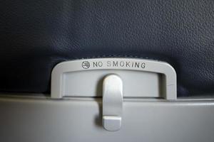 sinal de não fumar de avião foto