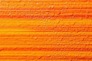 fundo de listras laranja molhado foto