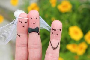arte de dedos de casal feliz para se casar. outra mulher chateada. foto