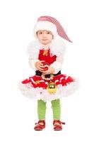 menina com roupa de ajudante de papai noel foto