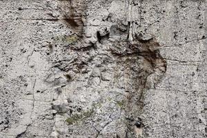 feche a vista em uma textura de granito e parede de pedra em alta resolução. foto