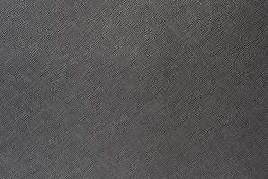fundo cinza de um material têxtil com padrão de vime, closeup.