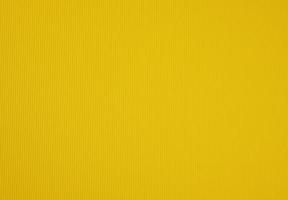 cor amarela de papelão ondulado, fundo abstrato para designer foto