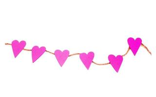 corações rosa em uma corda foto
