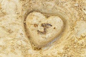 coração de areia na praia playa del carmen méxico. foto