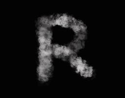 alfabeto realista de fumaça r se espalhando em fundo escuro foto
