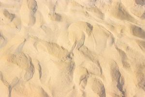 areia na praia para textura ou fundo foto
