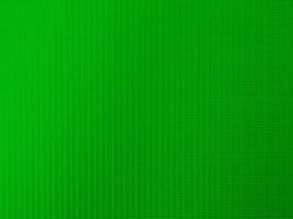 textura de tecido de veludo verde claro usada como plano de fundo. fundo de pano verde de cor de tom de material têxtil macio e suave. há espaço para texto e para todos os tipos de trabalhos de design. foto