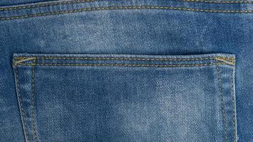 bolso de trás do jeans azul, quadro completo foto