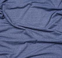 tecido de algodão azul enrugado para costurar camisetas e roupas foto