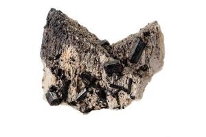 macro mineral pedra estudioso, Preto turmalina em a feldspato em uma branco fundo foto