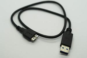 cabo USB 3.0 Difícil disco externo com uma branco fundo. foto