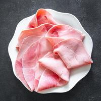 presunto carne carne de porco fatia de refeição fresca comida lanche na mesa espaço de cópia foto
